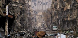 Strikes on east Syrian town kill 63