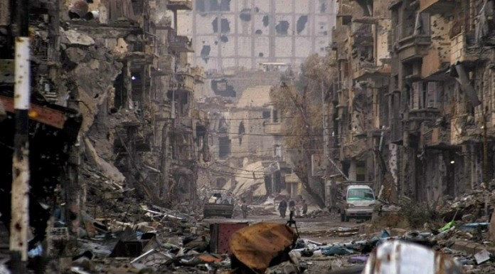 Strikes on east Syrian town kill 63