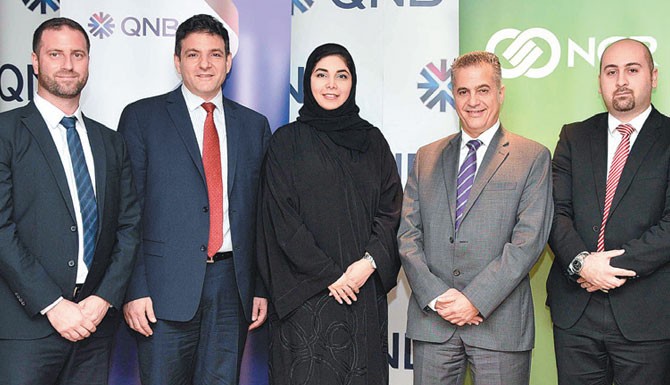 Qatar National Bank (QNB) has become the first bank in Qatar to introduce the NCR Aptra Interactive Teller Machine, from NCR Corporation, the global leader in consumer transaction technologies. The Interactive Teller technology, located at QNB's Al Sadd branch, which is powered with an interactive touchscreen, allows a live teller to take remote control of an ATM to assist customers with up to 95 percent of traditional transactions typically completed by tellers inside a branch.