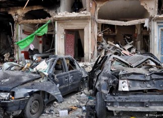 Twin car bombs in Syria kill nearly 50