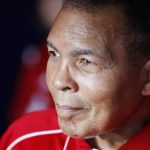 Ali looks to the field prior to an NCAA college football game