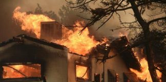 Homes burned by massive California wildfire