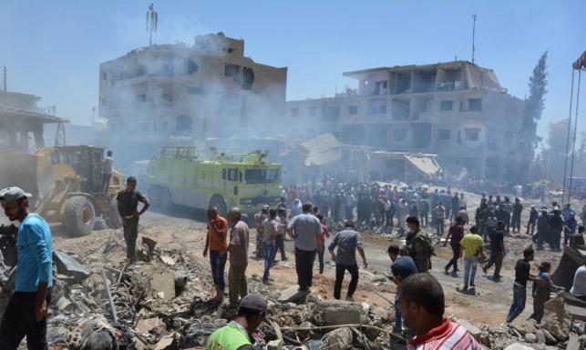 Truck bomb blast kills dozens in northeast Syria city