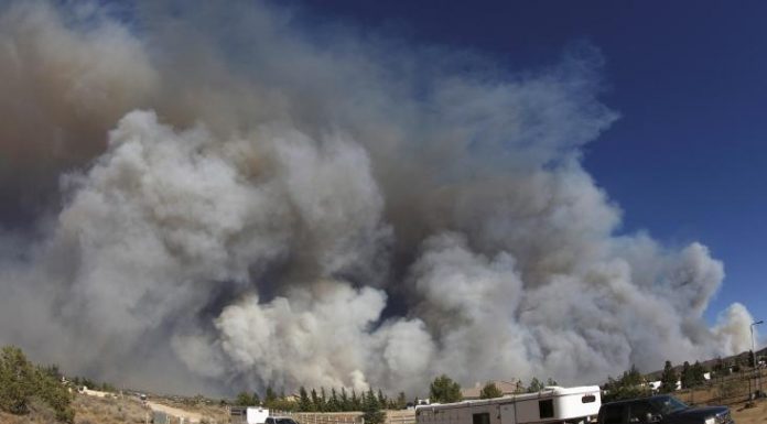 Orders 82,000 people to evacuate over wildfire Orders 82,000 people to evacuate over wildfire