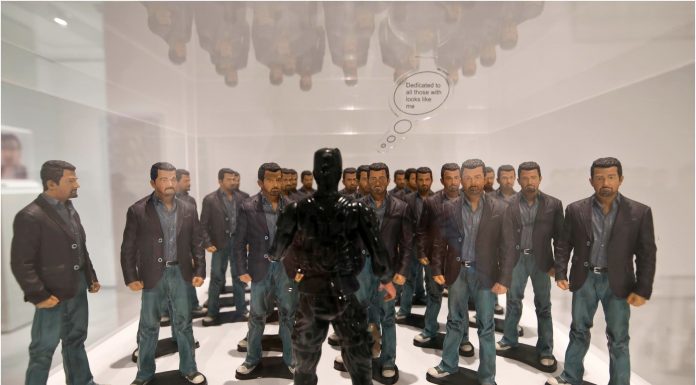 Artist laments ‘flying while brown’ in new Qatar art exhibition Artist laments ‘flying while brown’ in new Qatar art exhibition