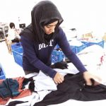 haya inspecting garments in factory fb