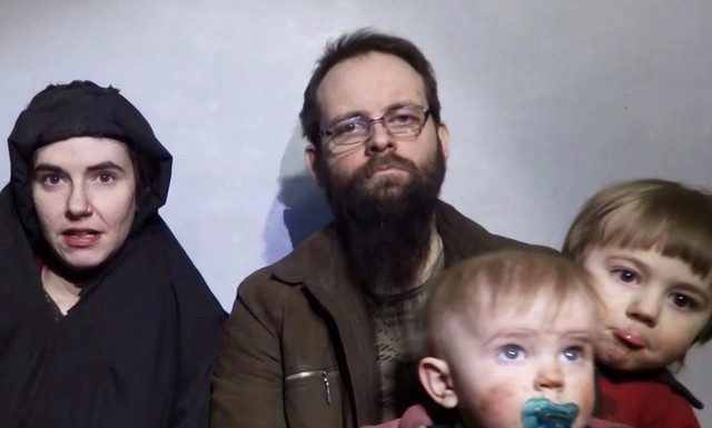 Couple captured by Taliban appear in hostage video with children