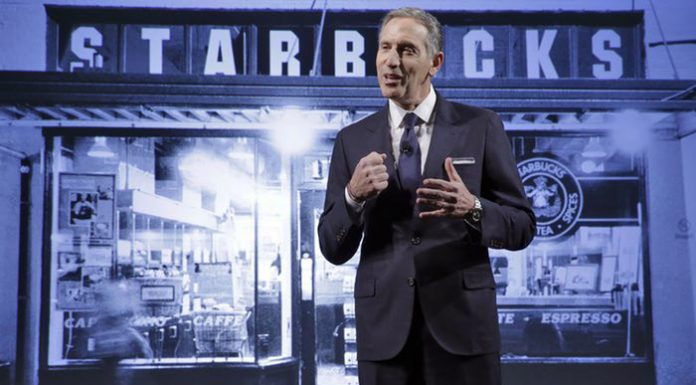 Starbucks vows to hire 10,000 refugees as US companies condemn Trump travel ban