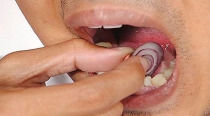 PLACE AN ONION SLICE ON YOUR TEETH. WHEN YOU REMOVE IT…