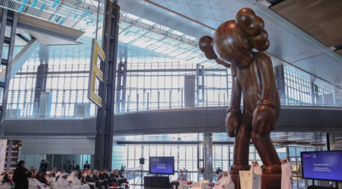 Small Lie finds a new home in Doha as HIA unveils 32-foot sculpture by KAWS