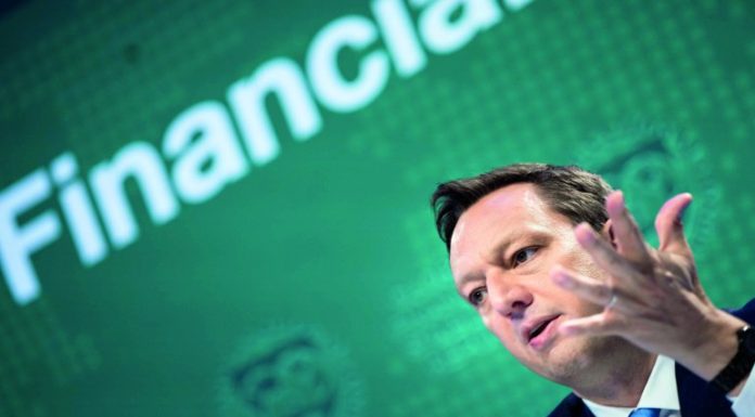 IMF warns of risks as central banks tighten