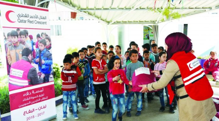 QRCS distributes 7,300 bags to Syrian students