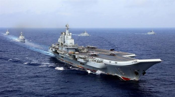 China bomber makes debut landing on South China Sea island