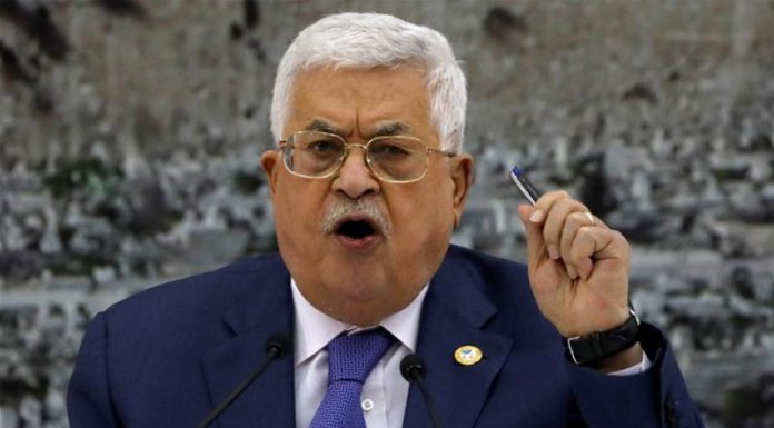 Palestinian president fires advisers, orders return of bonuses