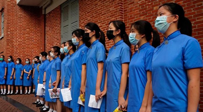 Hong Kong school students form human chain after weekend protests