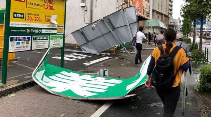 Typhoon hits Tokyo area leaving one dead, transport in disarray