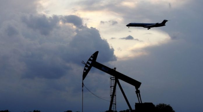 Oil prices under pressure as futures deadline looms