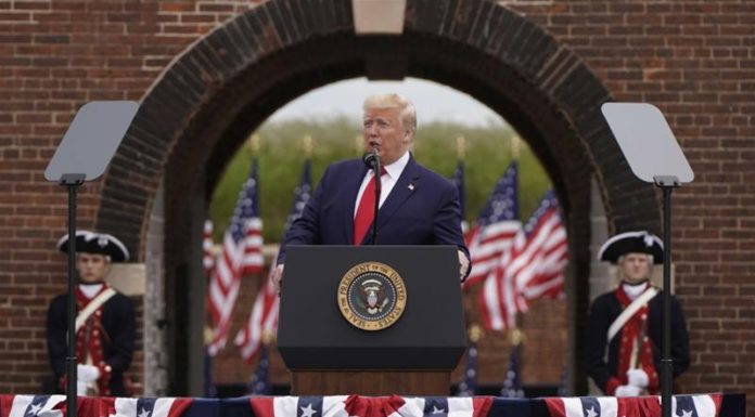 Trump urges end to lockdowns as US COVID-19 deaths near 100,000