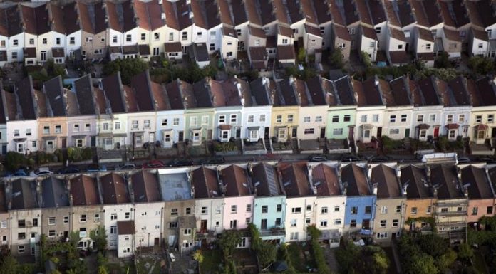 Global housing market seen recovering only gradually, poll shows