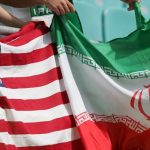 US & Iranian flags