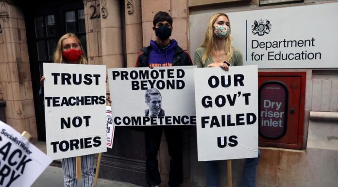 British government facing mounting criticism in exam row