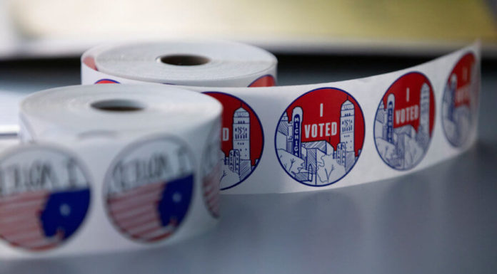 Warnings in Michigan, Minnesota over guns at polling places on Election Day