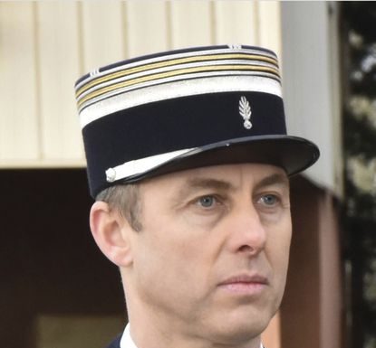 Police conduct raids after beheading of French teacher