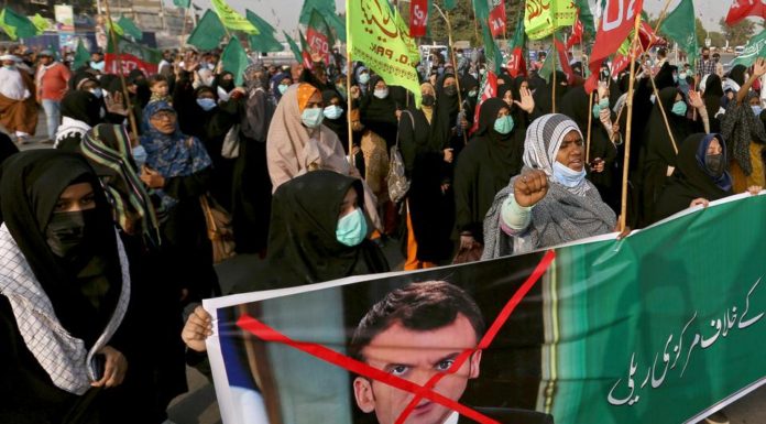 Muslims’ protests continue against France as Macron tries to calm anger