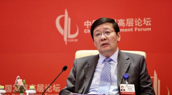 Former China finance minister says U.S.-China frictions may not ease even with Biden as president