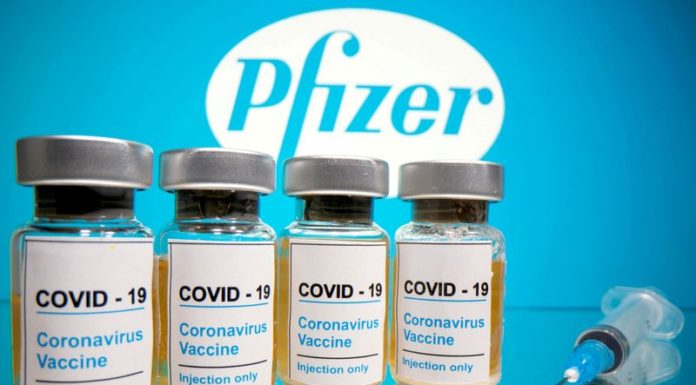 Explainer-I just got a COVID-19 vaccine. Now what?