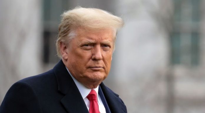 Millions of Americans lose jobless benefits as Trump refuses to sign aid bill