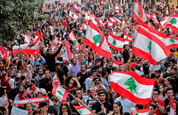 Protesters in Lebanon clash with police over virus lockdown