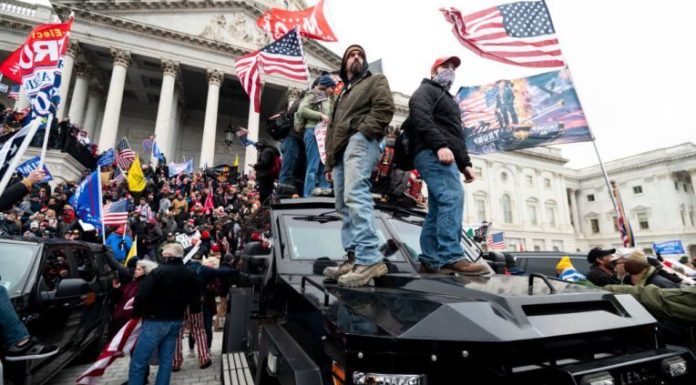 Capitol police officer dies of wounds after clashes with Trump mob
