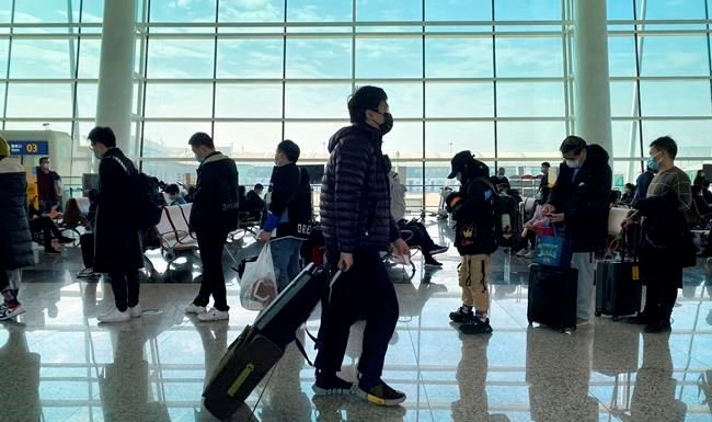 WHO team arrives in Wuhan as China reports first Covid-19 death since May