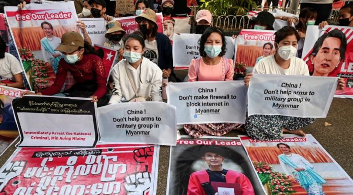 Three wounded in Myanmar as hundreds of thousands of protesters defy junta