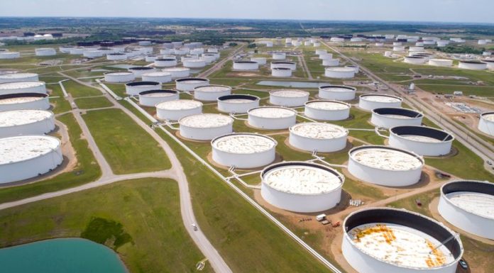 Oil drops on dollar strength and OPEC+ supply expectations