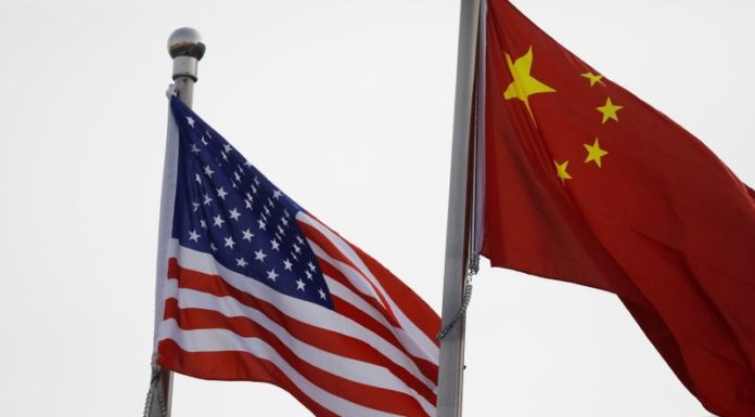 Biden on track to apply Trump-era rule targeting Chinese tech supply chain concerns