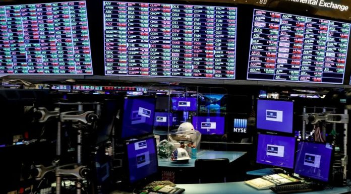 Wall Street ends lower as Apple and Tesla retreat