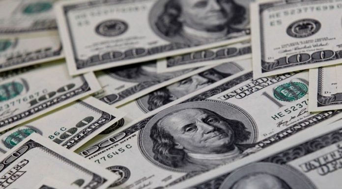 Safe-haven dollar on back foot as U.S. yields slide, boosting risk appetite