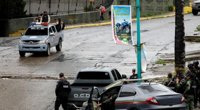 Clashes between police, Caracas gang leave 26 dead, Venezuela says