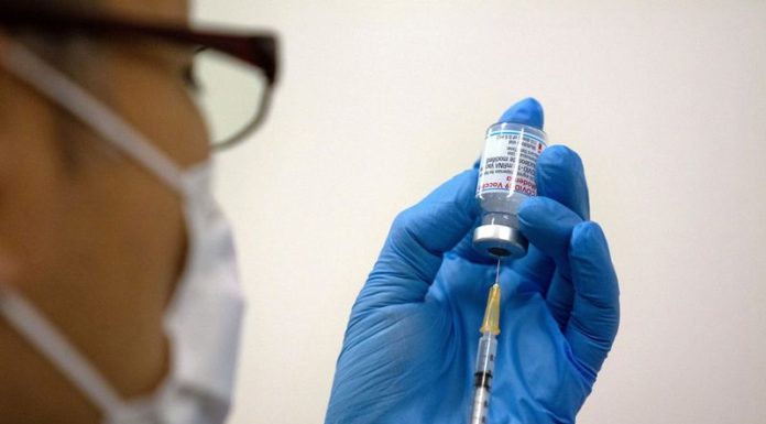 Japan’s Moderna vaccine contamination woes widen as regions put holds on more shots