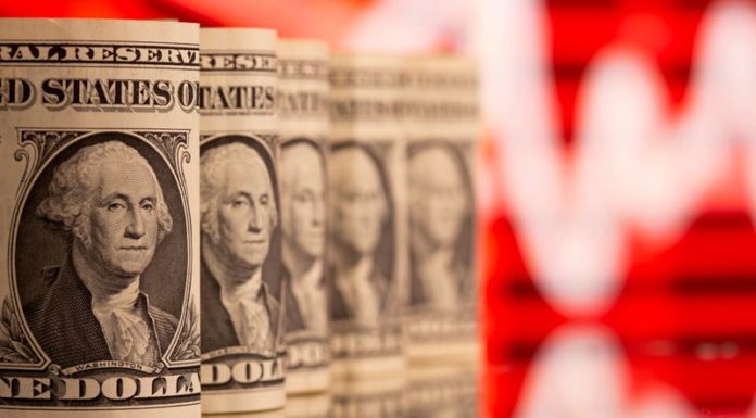 Dollar near 2-week low as investors look to U.S. jobs data