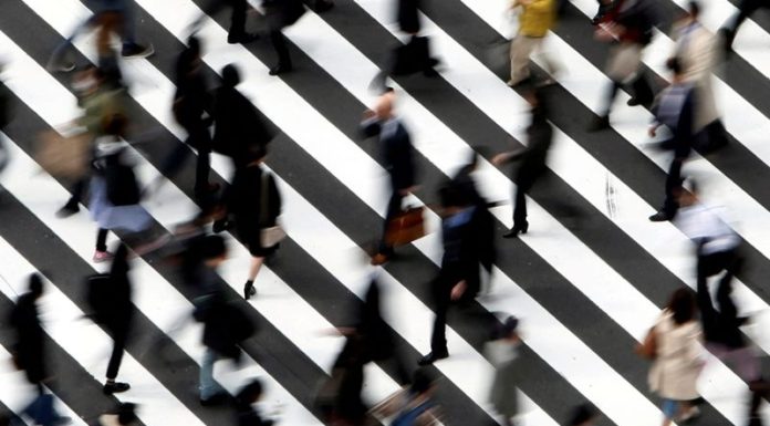 After decades of flat pay, some Japan firms boost salaries to retain skilled staff