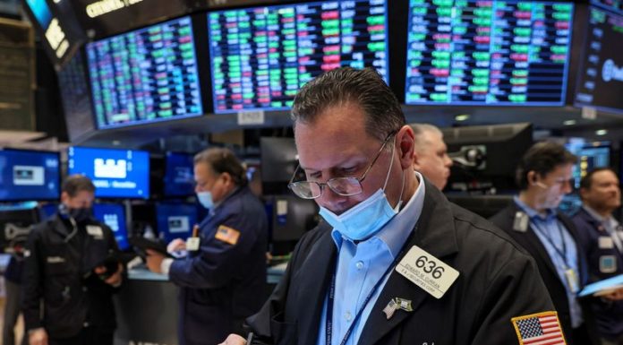 Wall Street slumps in broad swoon to end bumpy week
