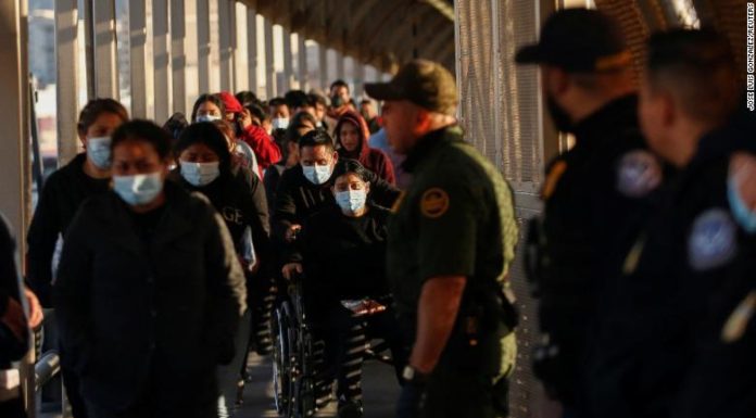 Federal judge temporarily blocks Biden administration from ending Title 42 Covid border restrictions for migrants