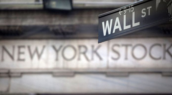 Wall Street buoyant on earnings optimism, overshadows rising yields