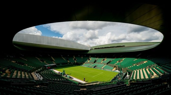 Tennis-Russian players to be barred from competing at Wimbledon – report
