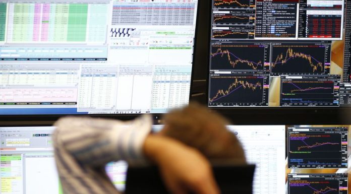 Nasdaq drags on Wall Street, bond yields dip