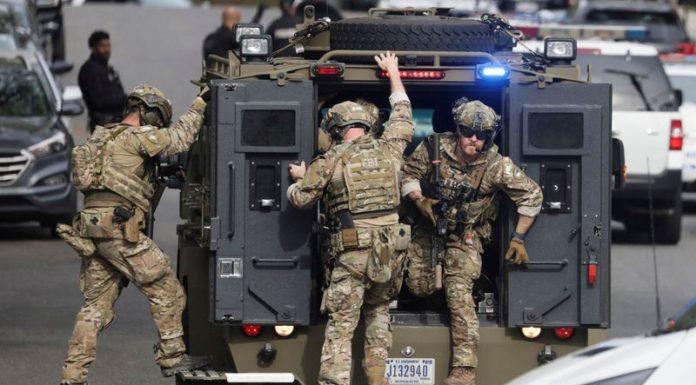 Gunman takes own life after wounding 4 near elite Washington prep school, police say