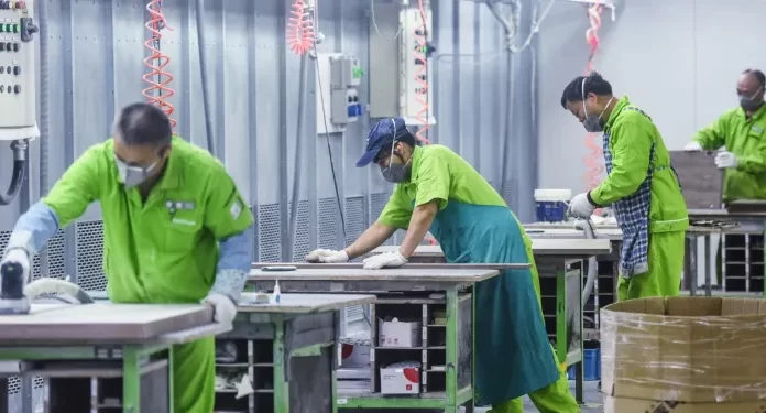 China’s economy grows faster than expected, but falls short of target as risks